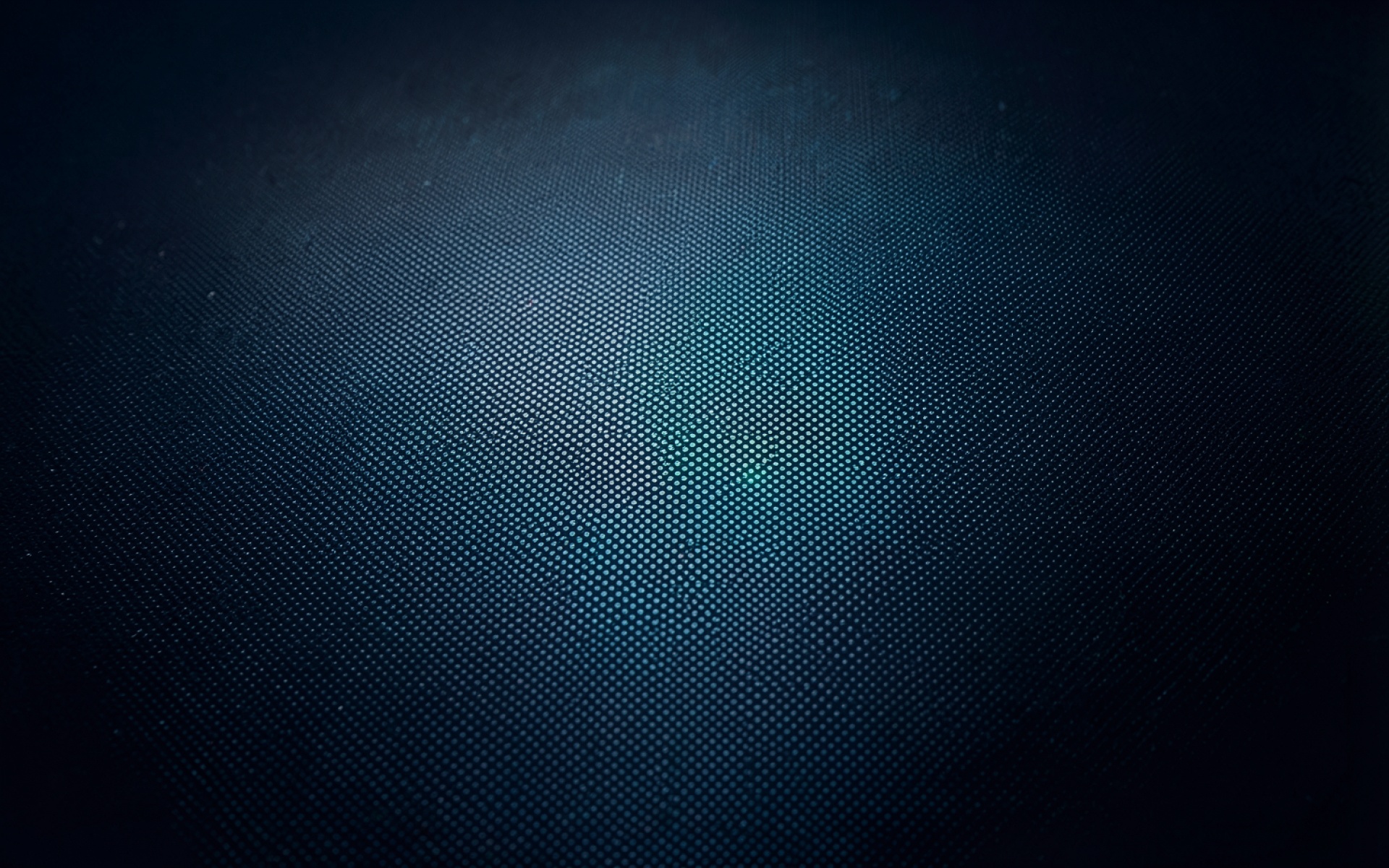 Темно-синий текстурный фон с центральным освещением